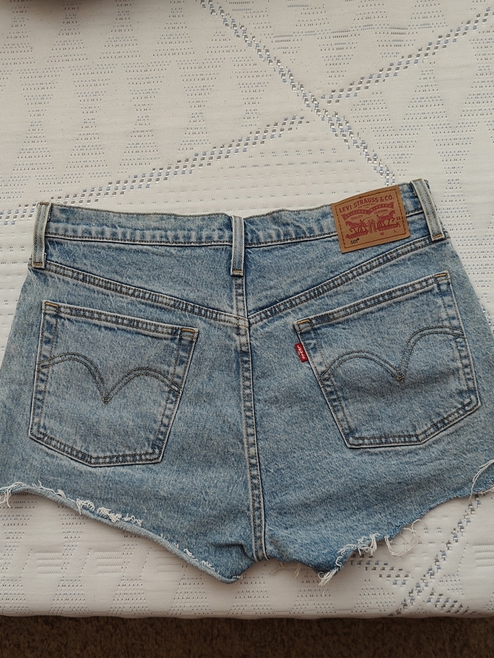 Vintage Levi's 501 Women's Faded Blue Denim Cutoff Shorts